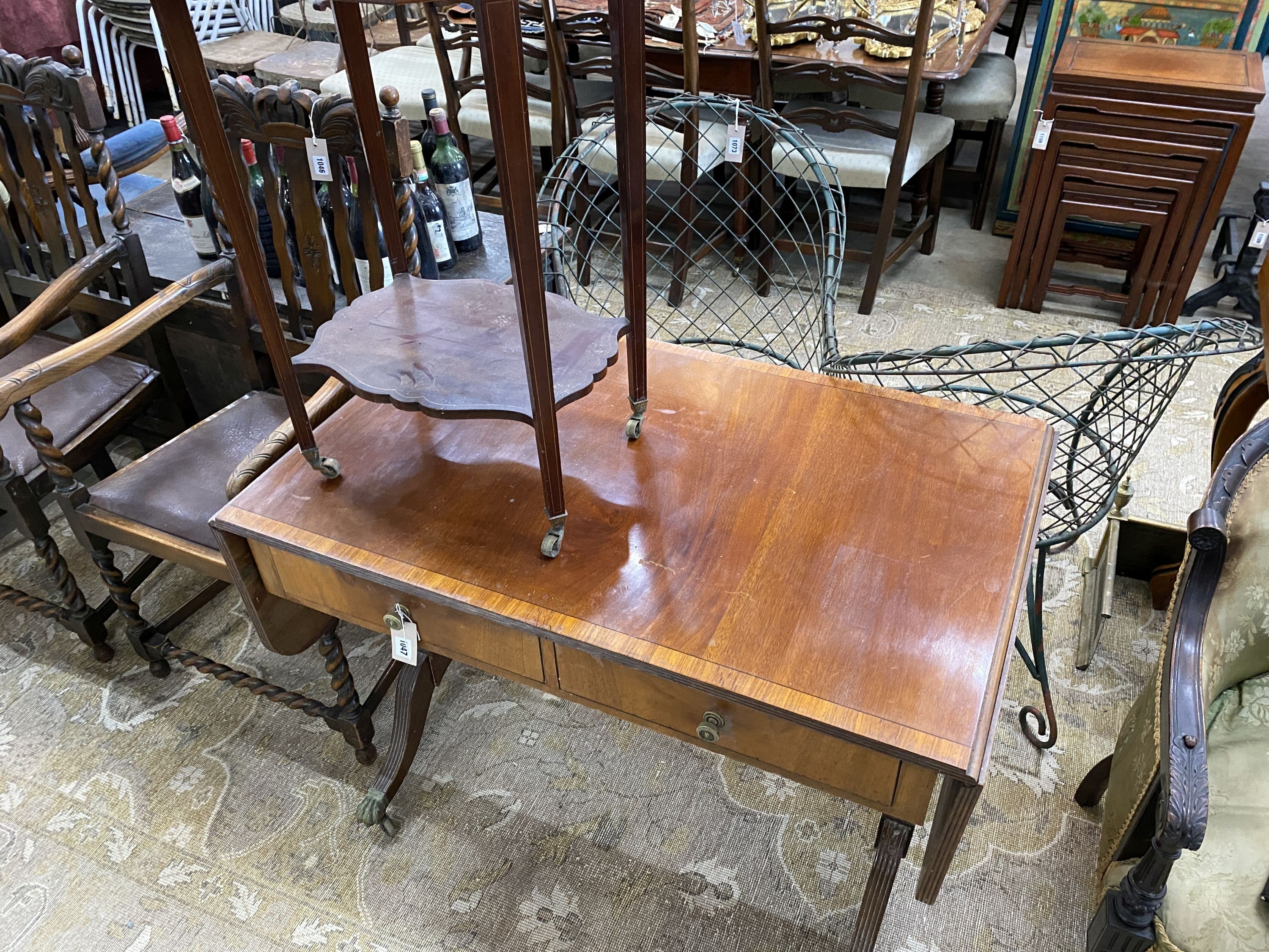 A Regency style banded mahogany sofa table together with an Edwardian octagonal mahogany centre table, larger width 98cm, depth 61cm, height 74cm